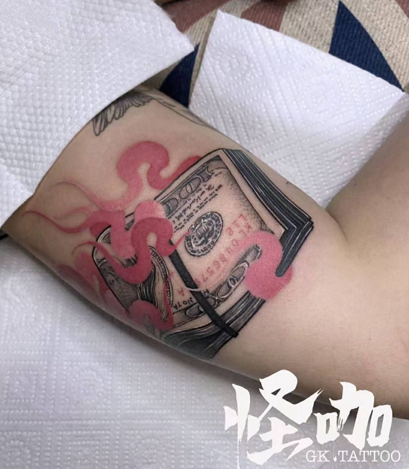 钱币纹身图片_手臂纹身图案