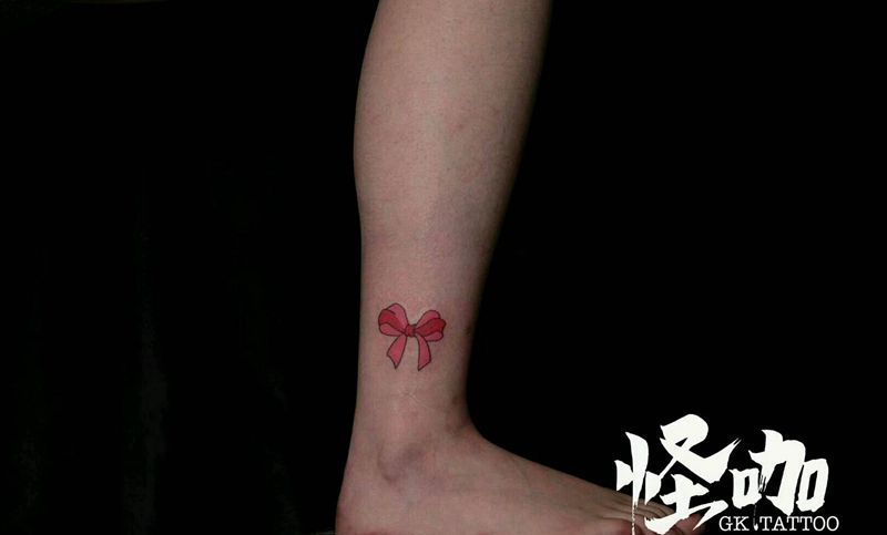 蝴蝶结纹身图片_手臂欧美静物原创成品纹身图案