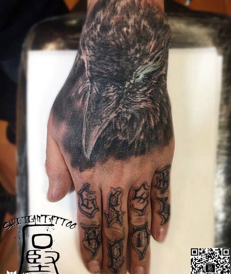 坚毅 勇敢 善良 自爱 忠贞 责任 感恩 纯粹纹身图片_动物写实欧美手部成品纹身图案