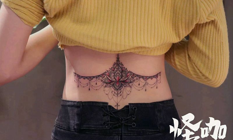 梵花纹身图片_腰部纹身图案