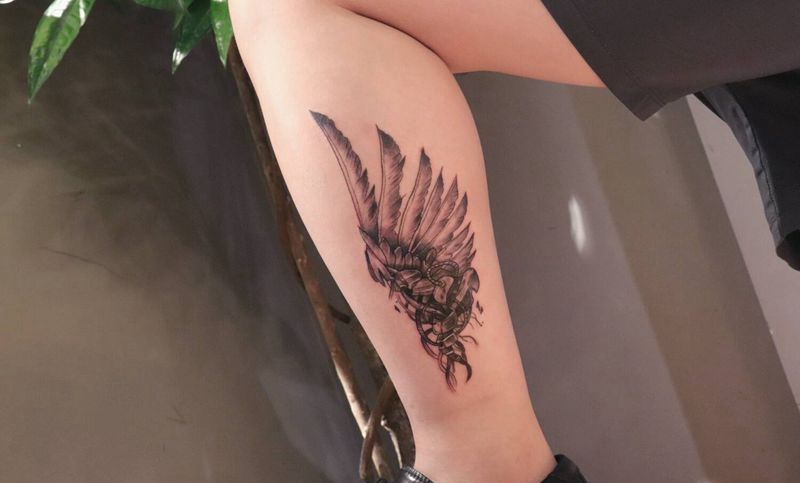 机械翅膀纹身图片_腿部纹身图案