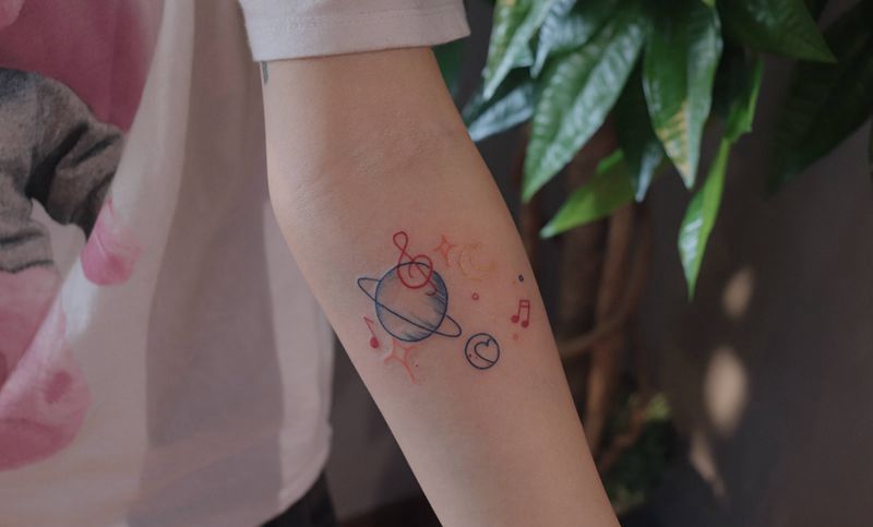 星球纹身图片_手臂纹身图案