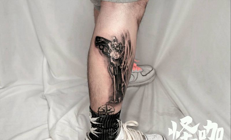 火枪纹身图片_腿部欧美写实纹身图案