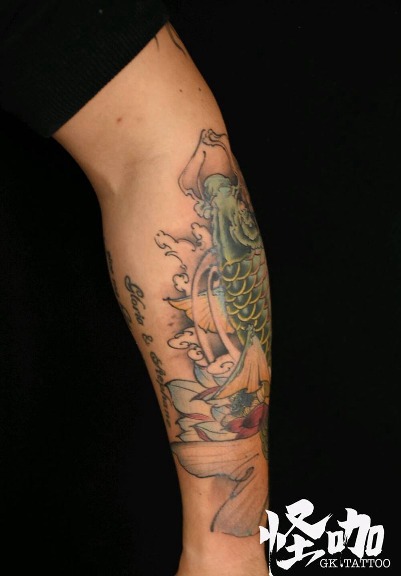 绿鲤鱼纹身图片_