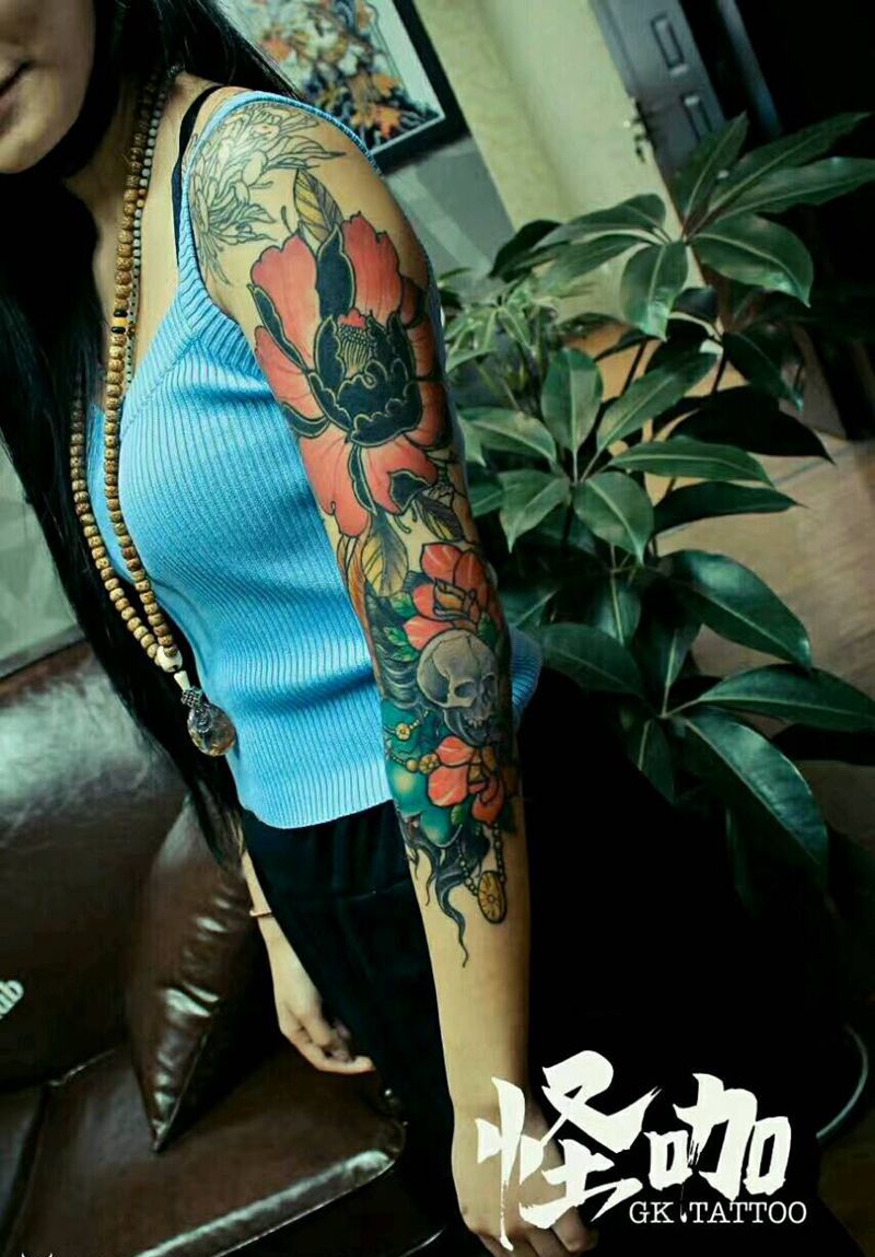 花臂作品纹身图片_手臂欧美植物鬼神原创成品纹身图案