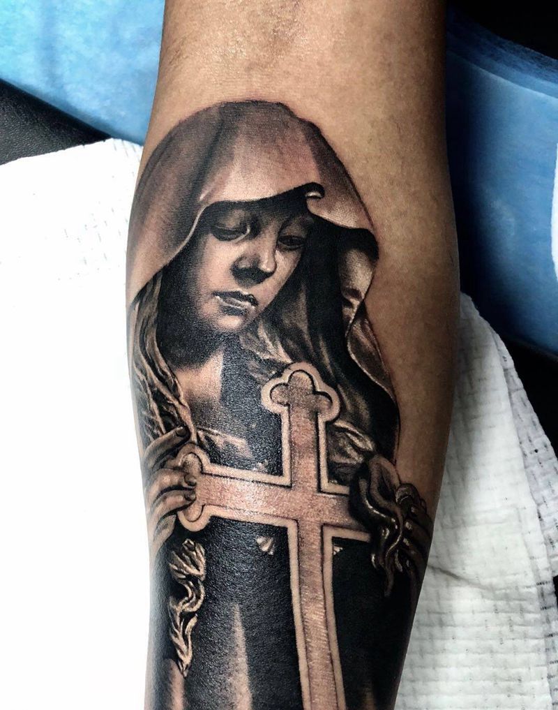 修女纹身图片_手臂欧美写实原创修女十字架纹身图案