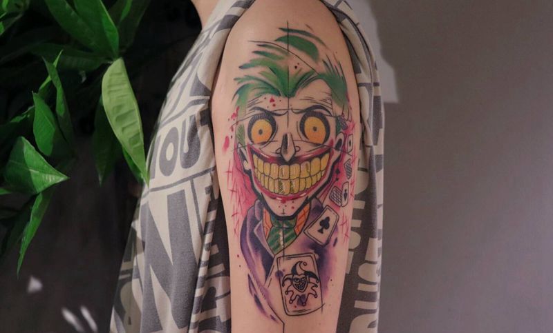 水彩小丑纹身图片_手臂水彩纹身图案