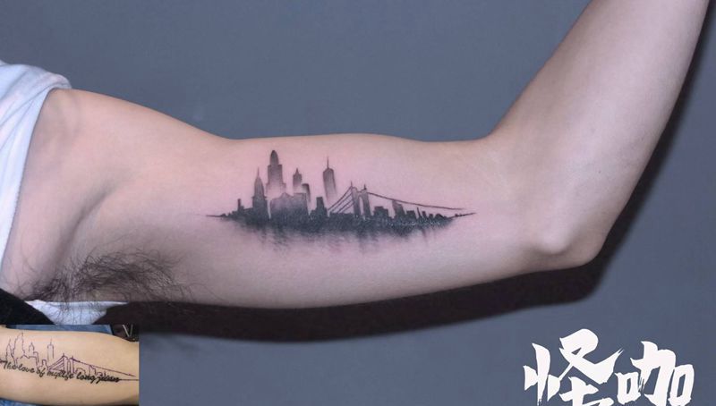 大城市[得意]纹身图片_手臂纹身图案