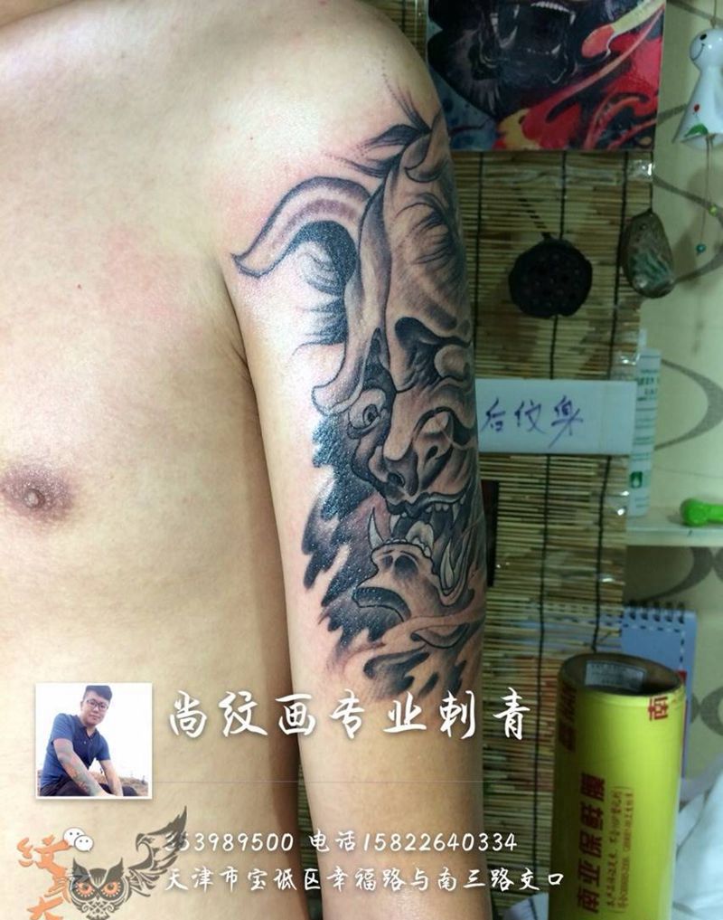 烟雾缭绕的般若纹身图片_手臂传统鬼神纹身图案