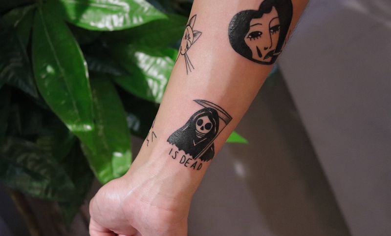 小死神纹身图片_手臂纹身图案