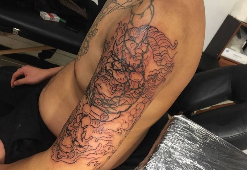 唐狮遮盖纹身图片_