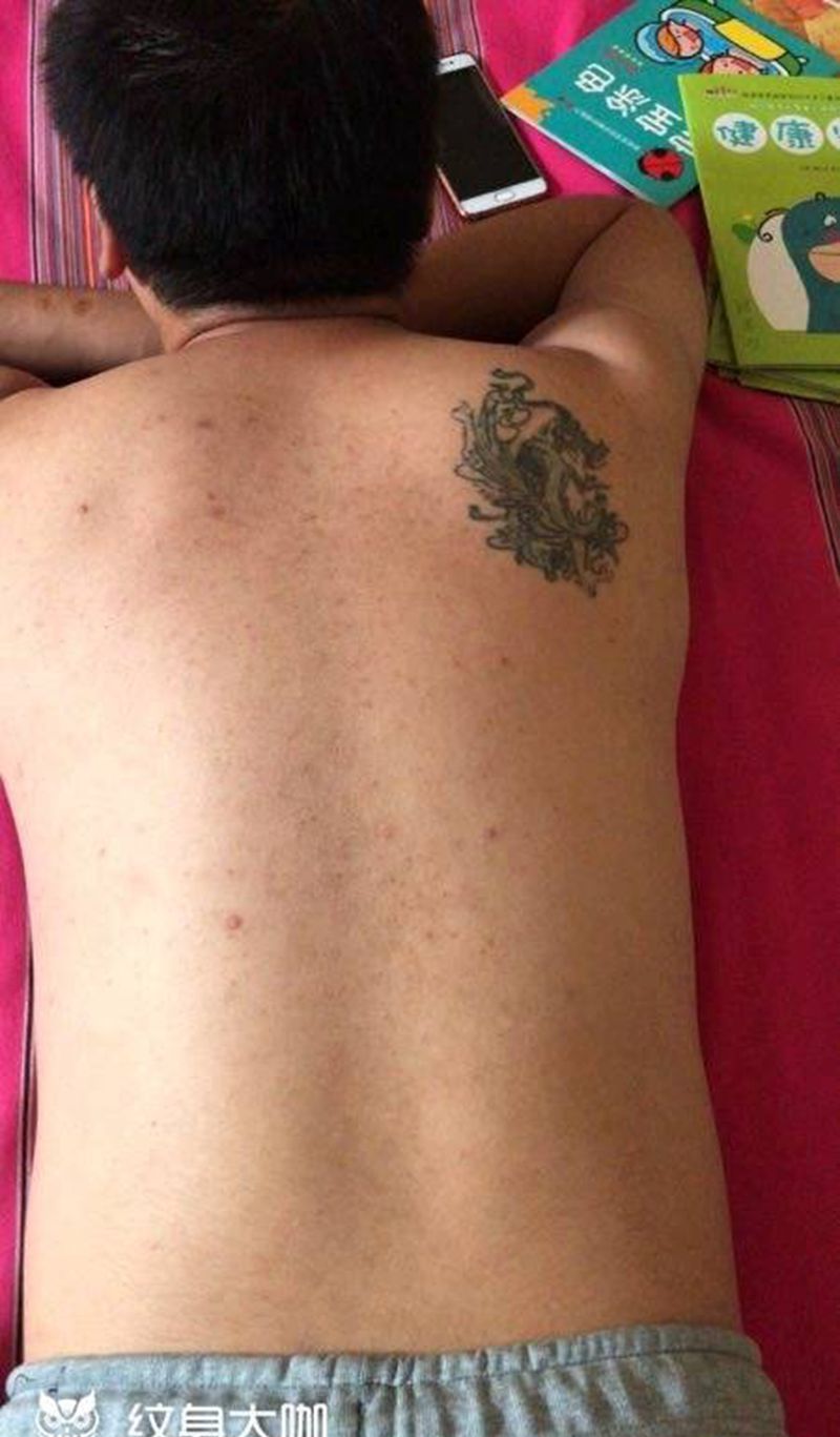 遮盖!纹身图片_背部纹身图案