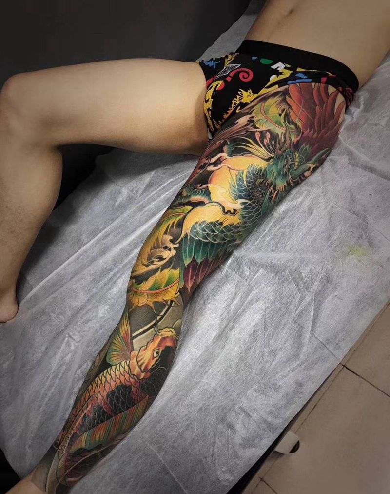 凤凰花腿纹身图片_腿部脚部新传统纹身图案