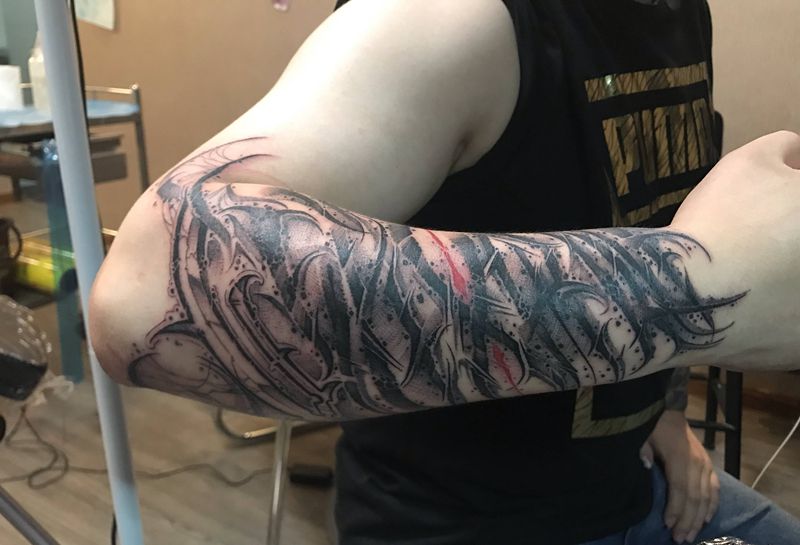 花体字纹身图片_手臂纹身图案