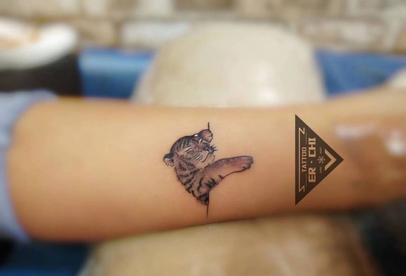 小狮子 鱼 可爱纹身图片_腿部纹身图案