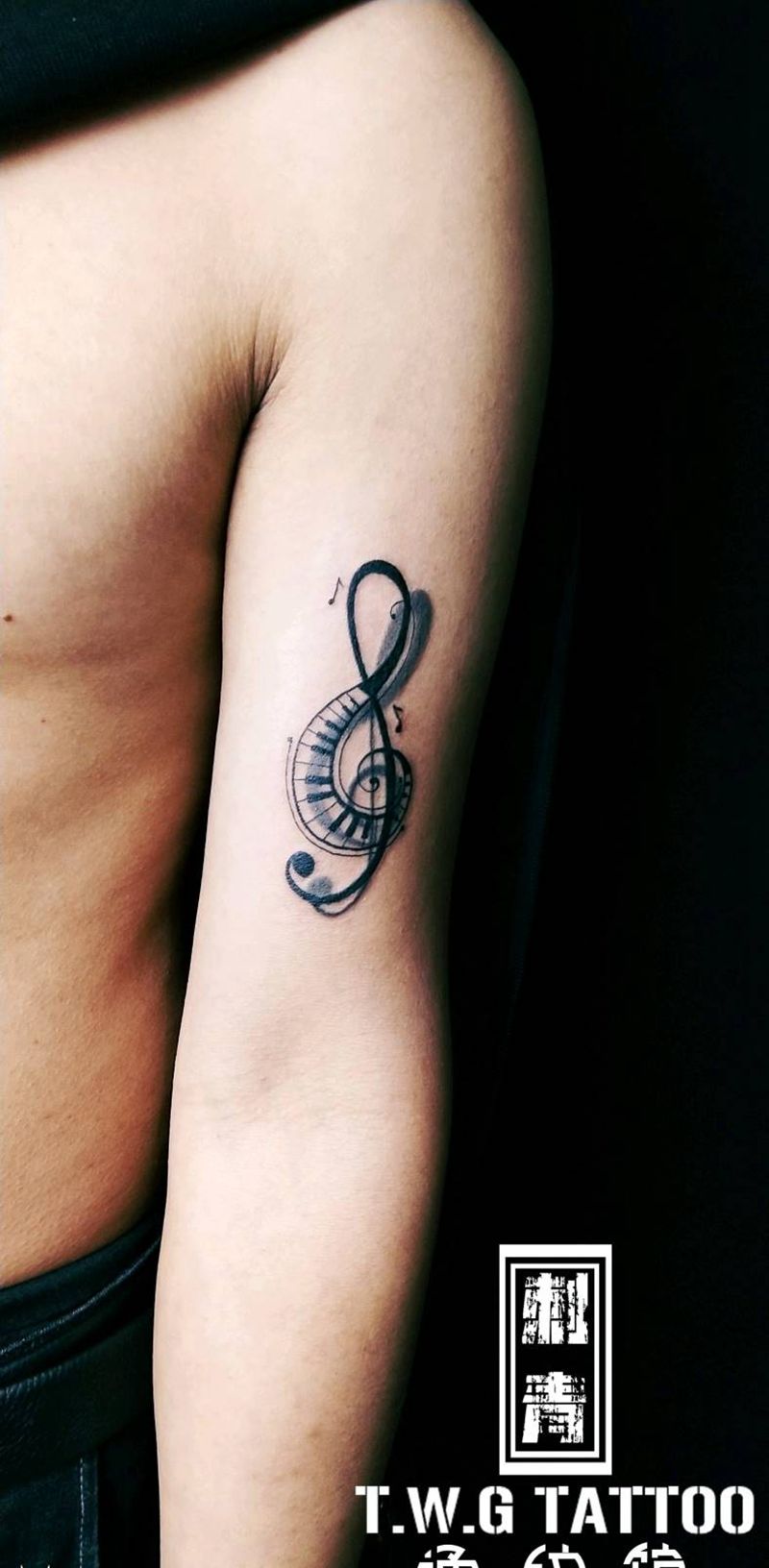 高音符纹身图片_手臂几何高音符纹身图案