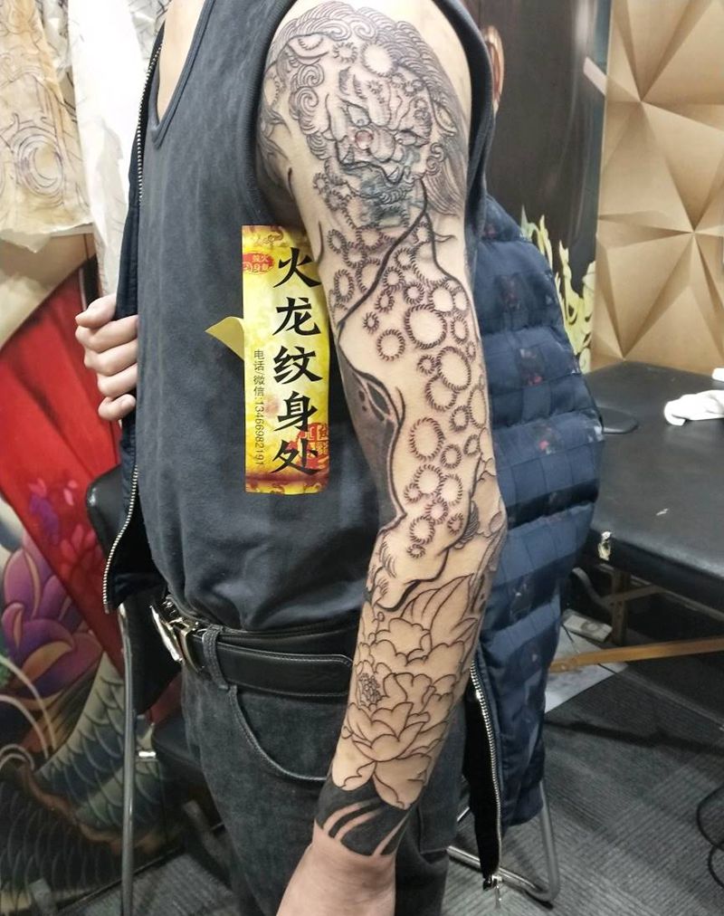 花臂遮盖图纹身图片