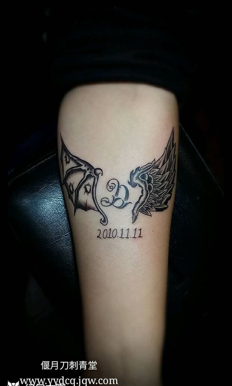 原创天使和恶魔的翅膀纹身图片_手臂清新原创运城纹身成品手稿纹身图案