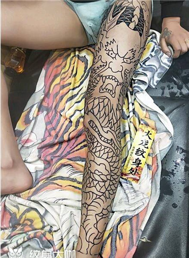 花腿龙纹身图片_腿部纹身图案