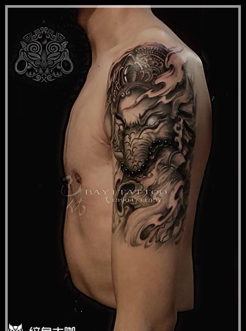 大臂象神纹身图片_巴依内蒙古专业手臂宗教传统纹身图案