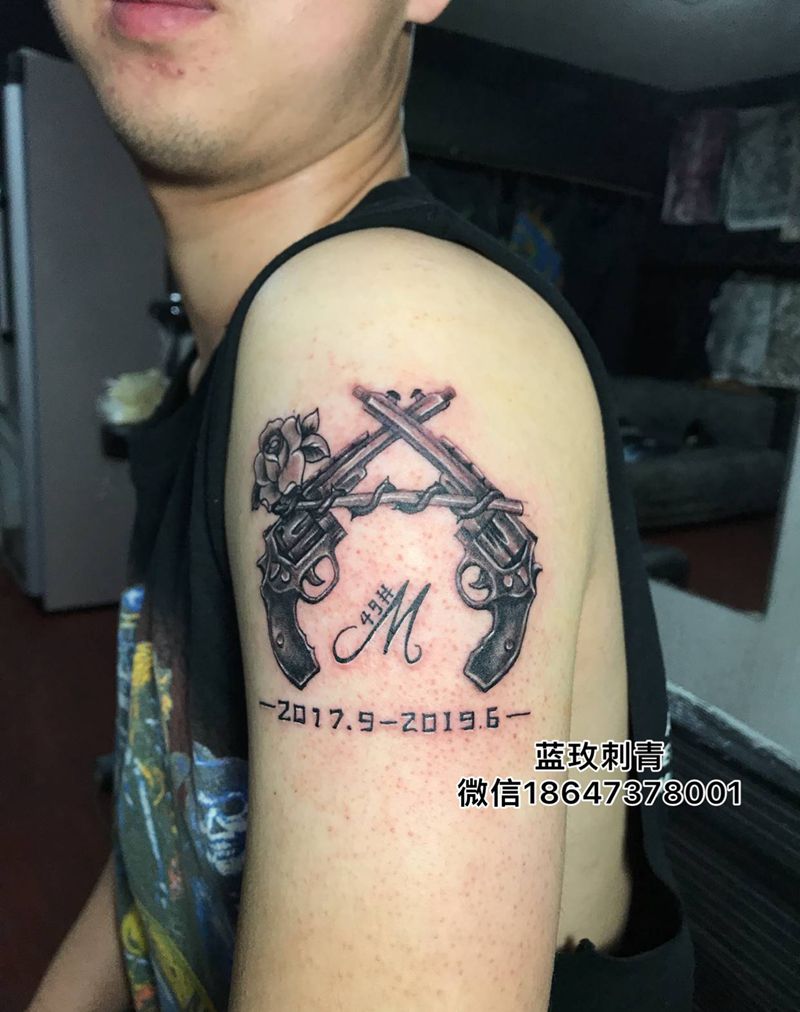 乐队图标纹身图片_手臂欧美写实New School纹身图案