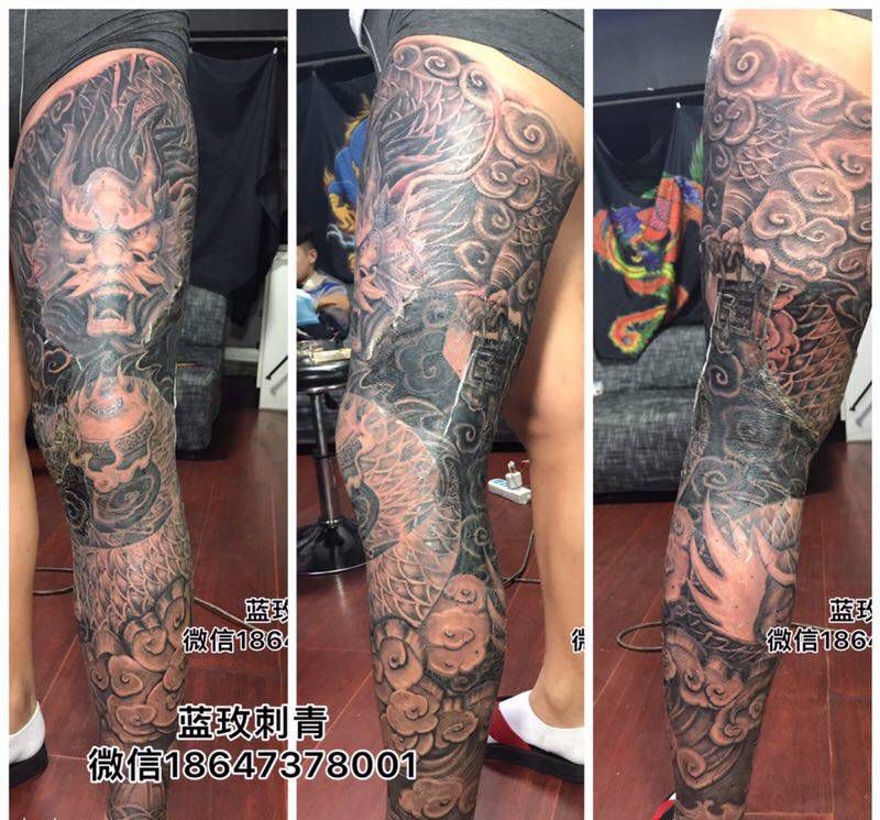 石雕龙纹身图片_腿部新传统纹身图案