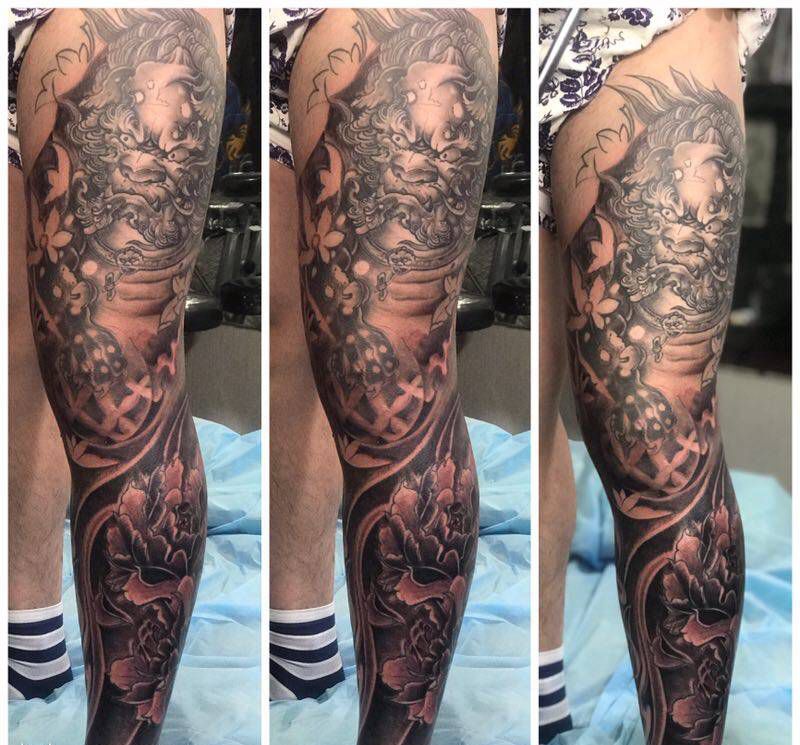 鱼与唐狮子花腿纹身图片_腿部新传统纹身图案
