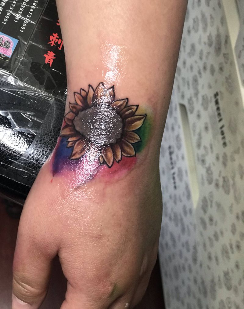 向日葵纹身图片_手部纹身图案