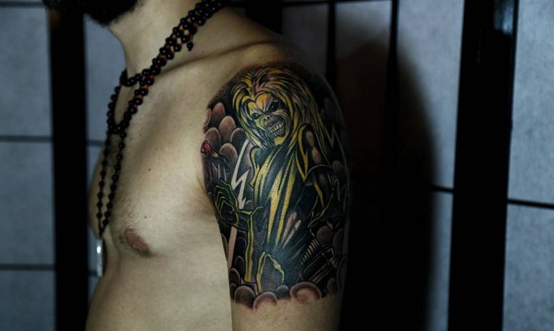 来自乌克兰的客人纹身图片_手臂欧美鬼神纹身图案