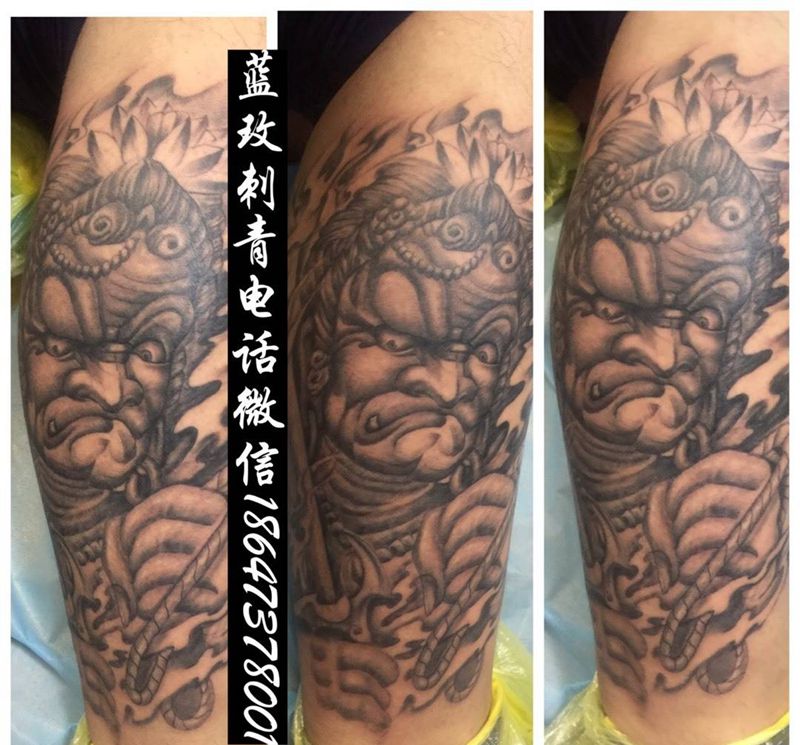 小腿不动明王纹身图片
