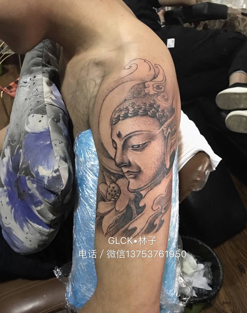 大臂佛。未完纹身图片_手臂传统人物纹身图案