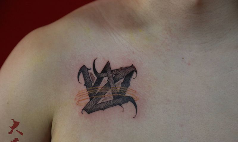 定制花体纹身图片_胸部花体字纹身图案