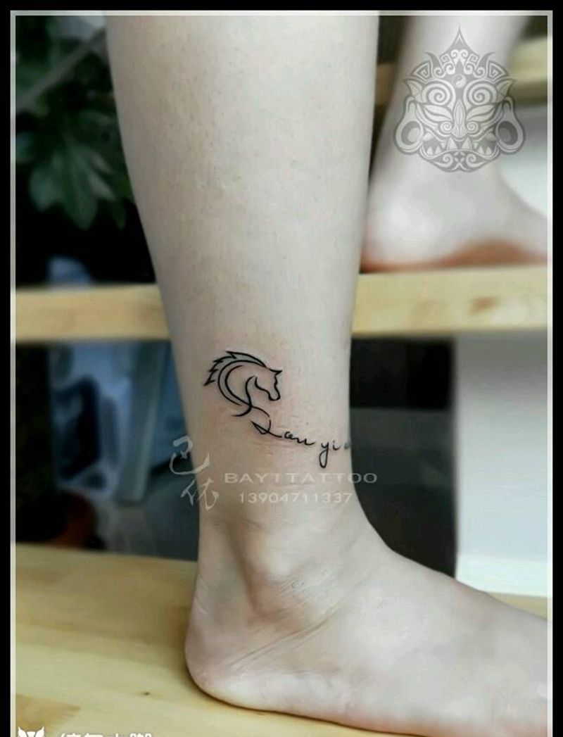 字母马头纹身图片_腿部字符内蒙古纹呼市巴依纹身图案