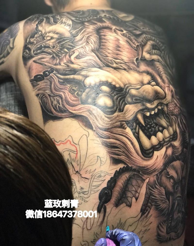 九龙拉棺未进行中纹身图片