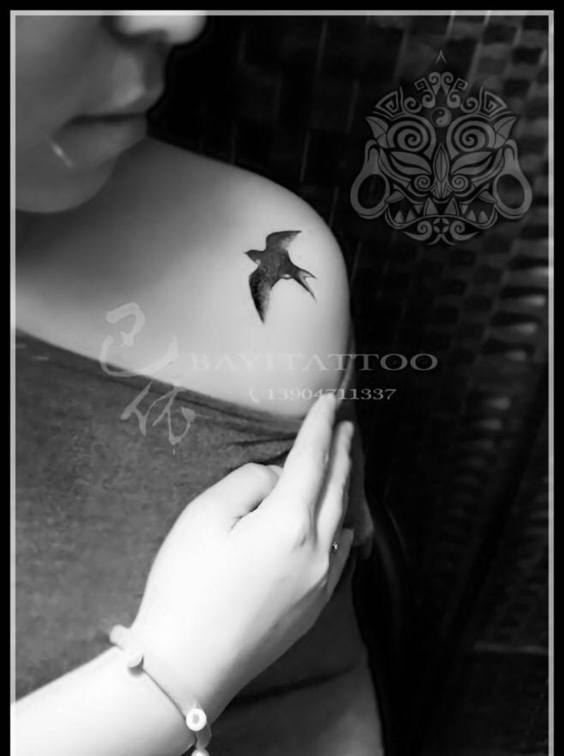 燕归巢纹身图片