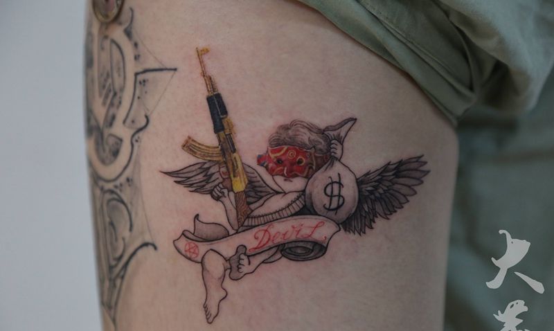 《devil》纹身图片_腿部欧美写实纹身图案