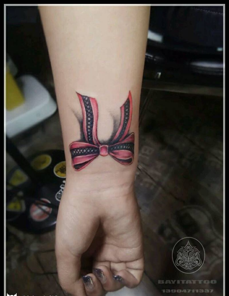 蝴蝶结纹身图片_手臂清新内蒙古纹呼市巴依纹身图案