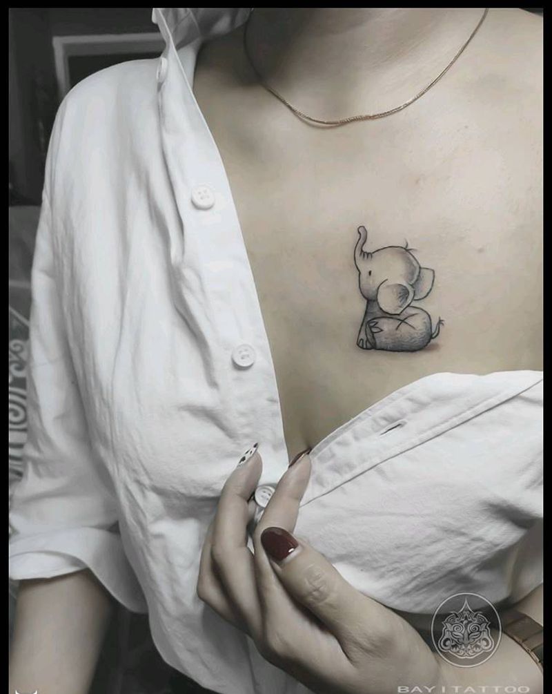 小象遮盖疤痕纹身图片_胸部小象遮盖疤痕小清新纹身图案