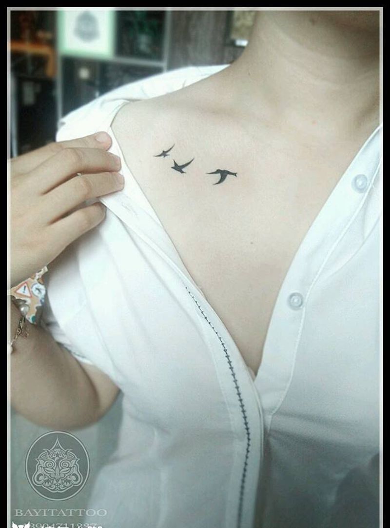 飞纹身图片_胸部清新内蒙古纹呼市巴依纹身图案