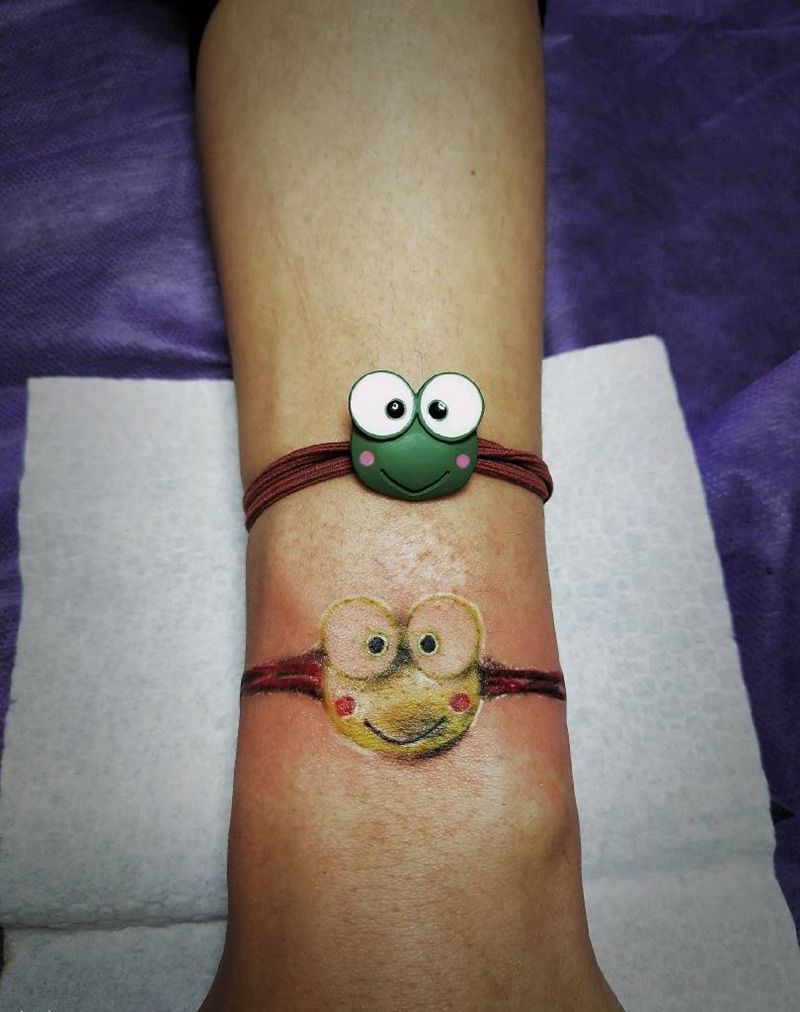 小皮筋纹身图片_手臂欧美写实青蛙纹身图案