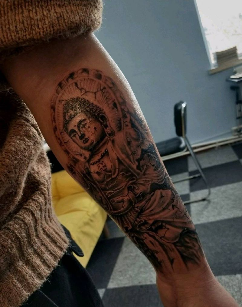 石雕佛纹身图片_手臂新传统石雕纹身图案