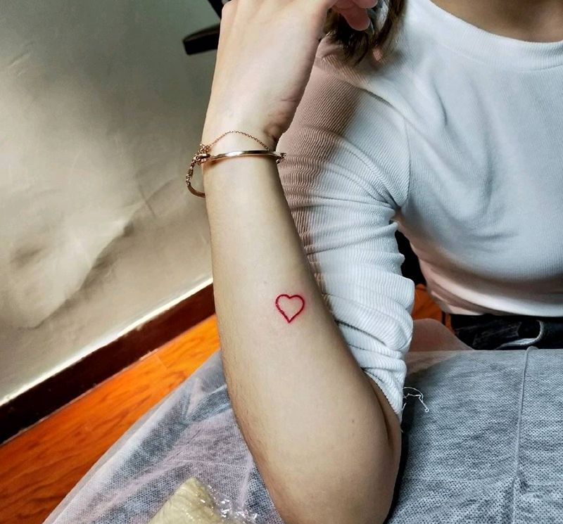 心纹身图片_手臂几何心纹身图案