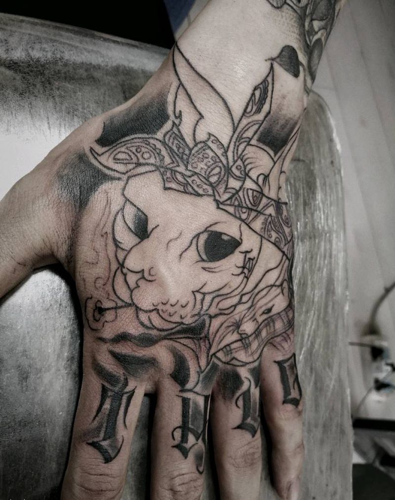 手背无毛猫纹身图片_手部水墨纹身图案