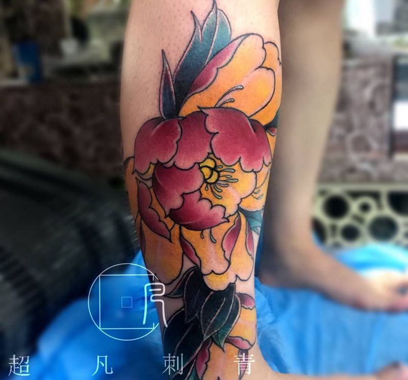 牡丹遮盖图腾鱼纹身图片