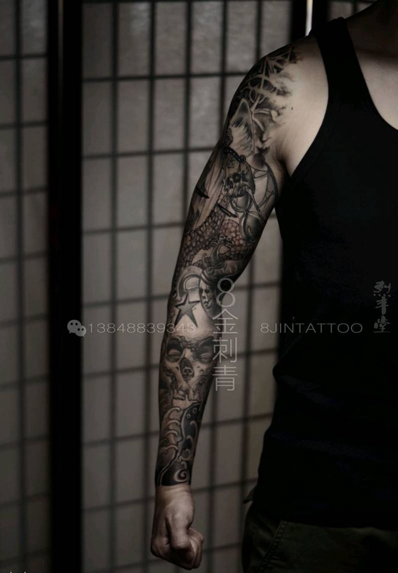 花臂修改纹身图片_手臂欧美人物宗教修改纹身图案