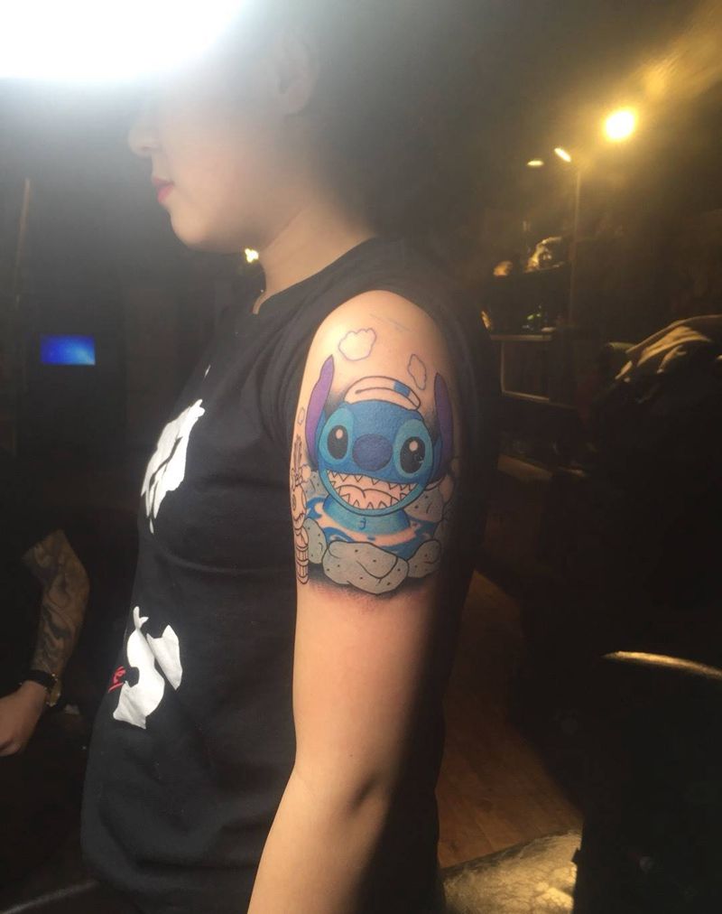 史迪仔纹身图片_手臂肩部欧美清新动物纹身图案