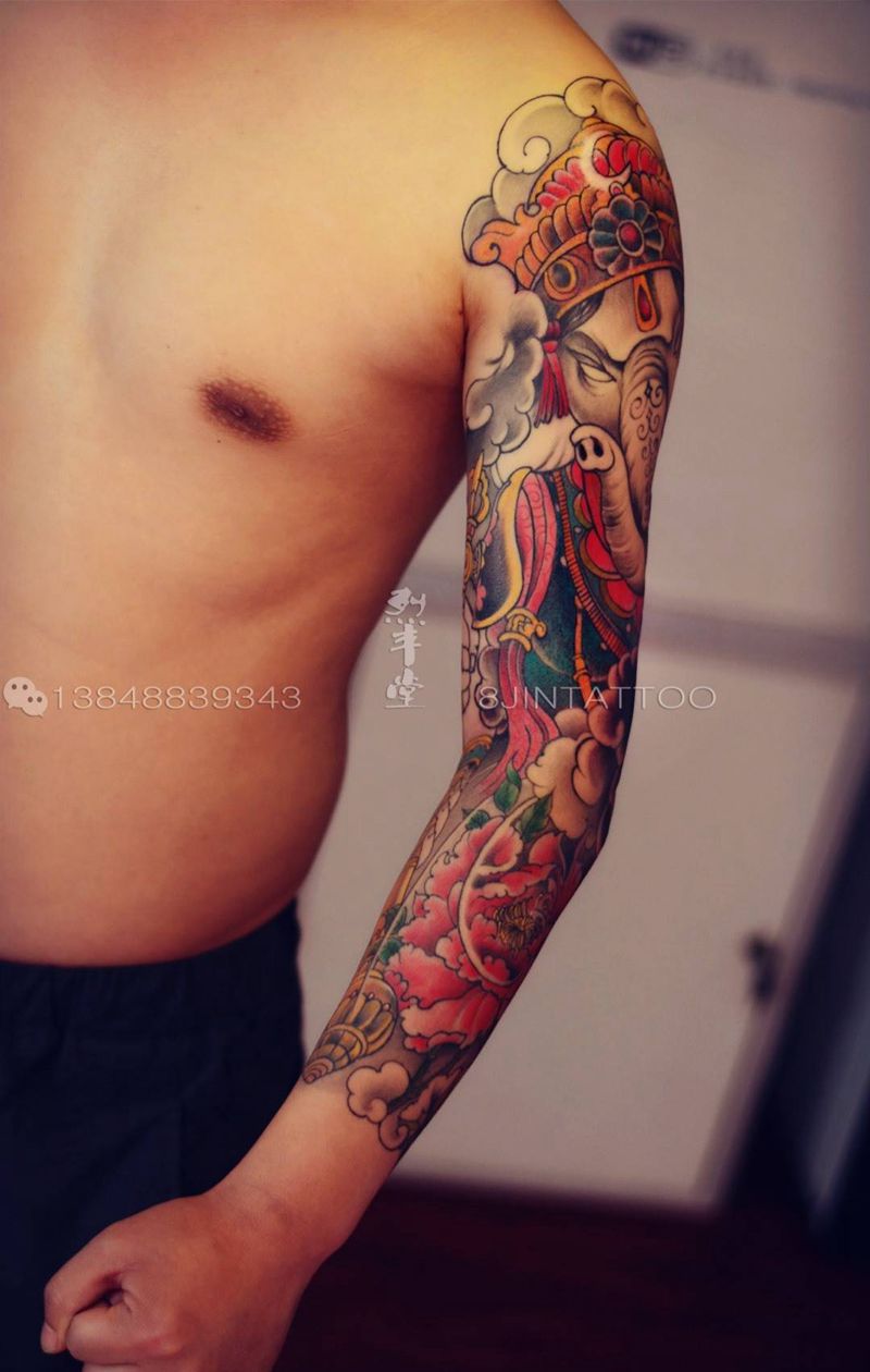 彩色象神花臂纹身图片_手稿手臂传统动物植物花臂纹身图案