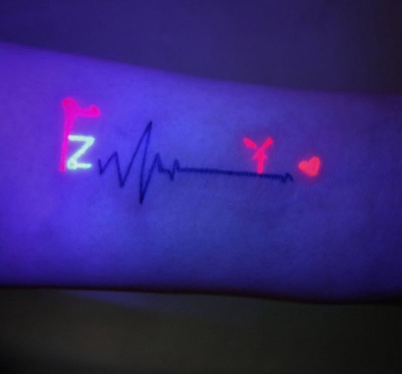 荧光纹身纹身图片_手臂几何纹身图案