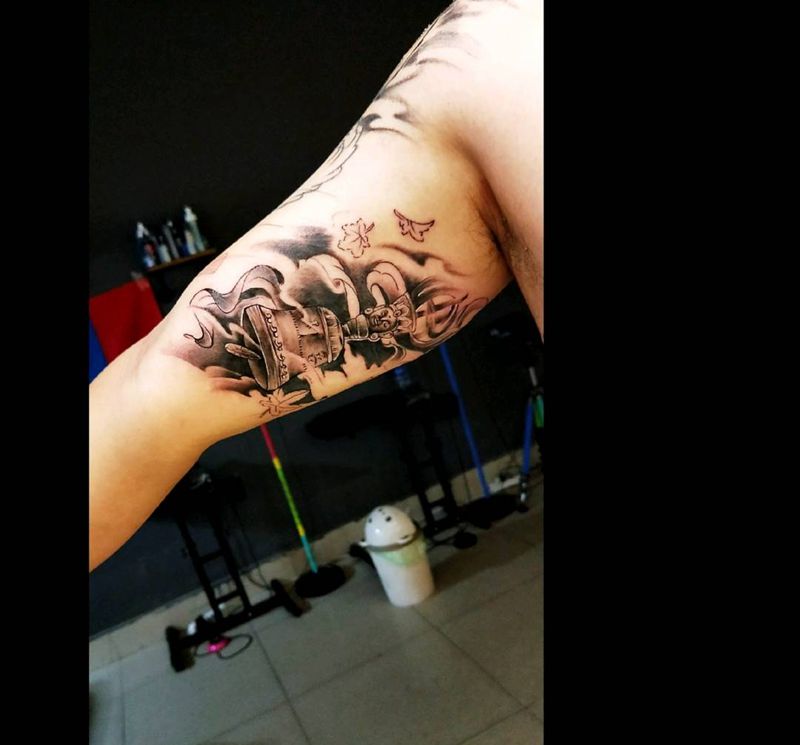铃铛纹身图片_手臂传统宗教成品纹身图案