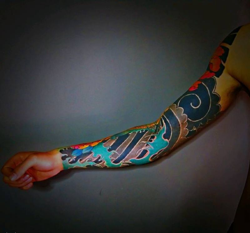 小花臂纹身图片_手臂老传统纹身图案